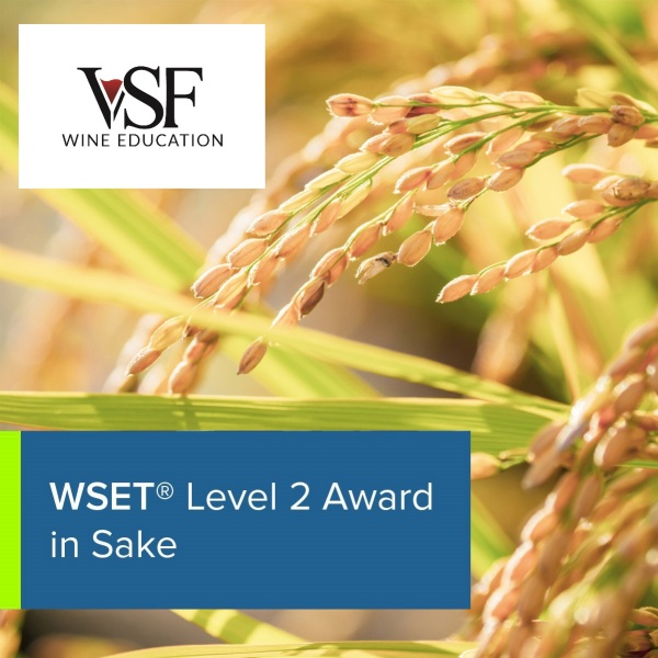 WSET Level 2 sake in front of a close up of rice grains in a field